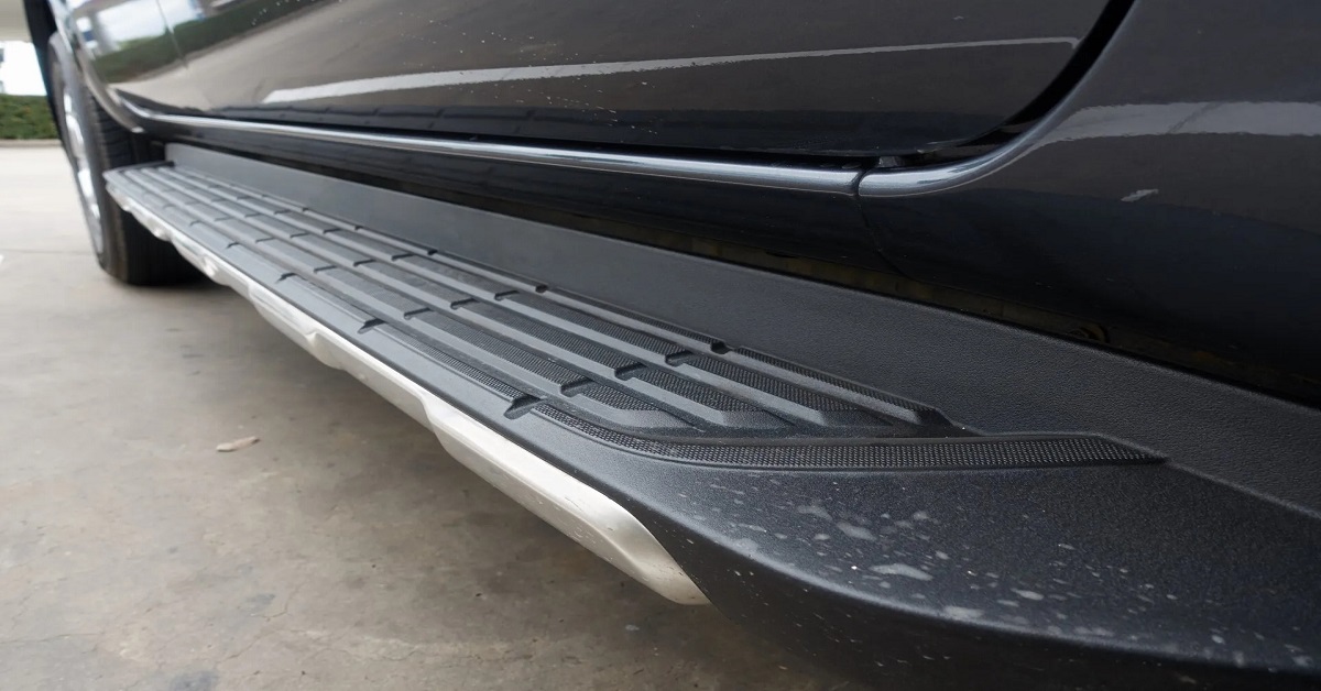 Close up of running boards installed on a truck