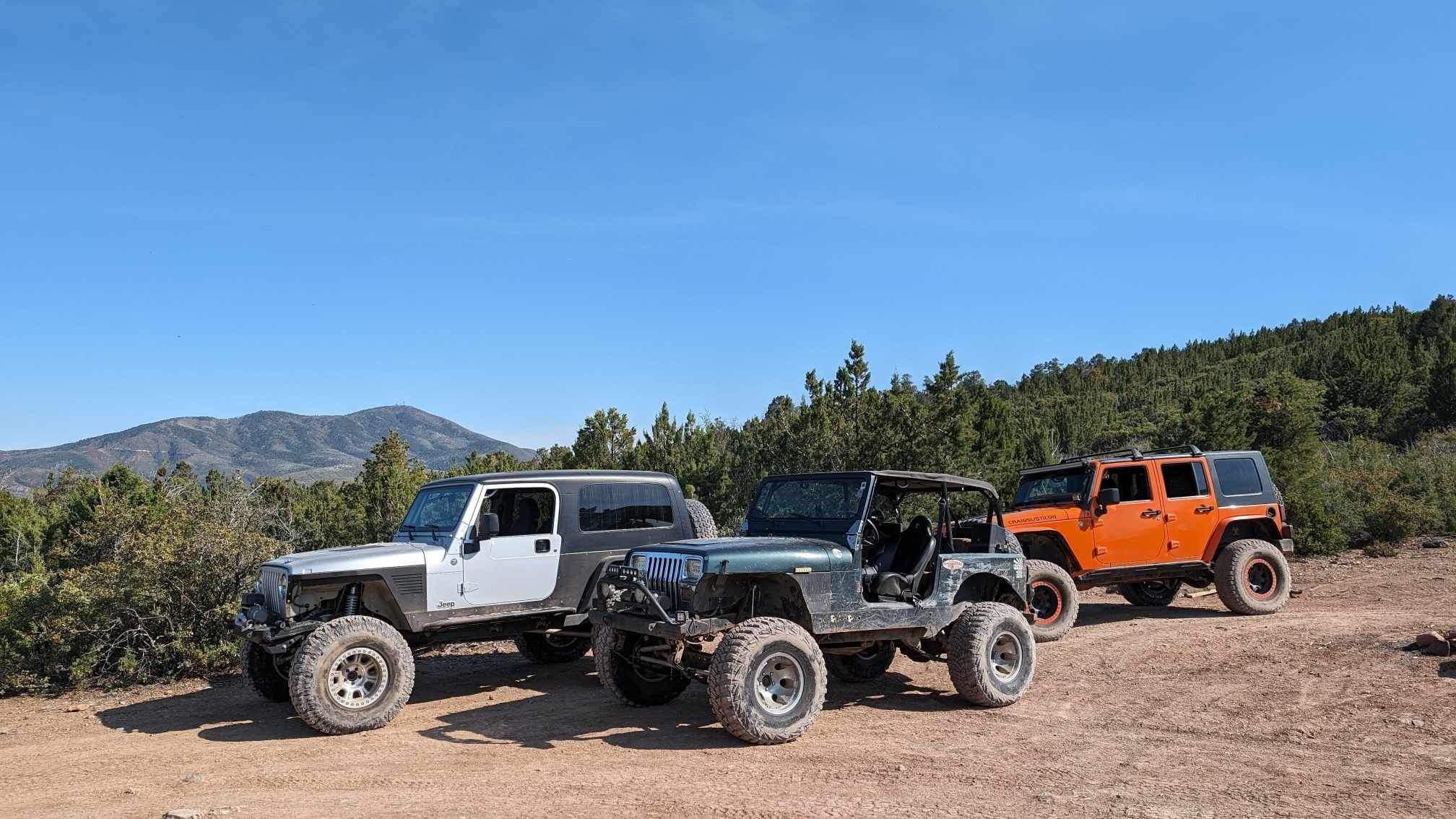 Three generations of Jeep Wranglers